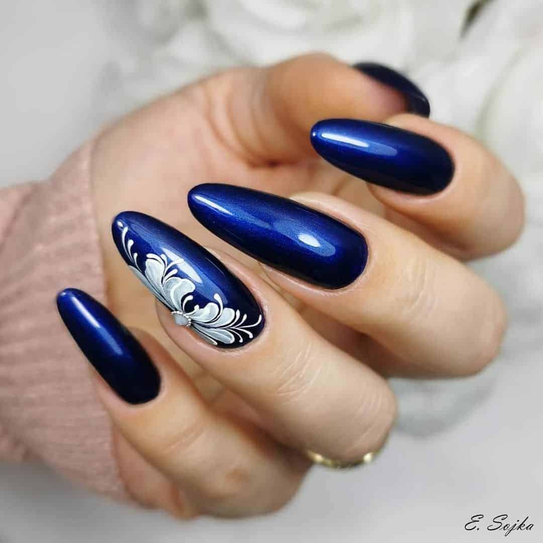 Metallic Blue Nails With Flower