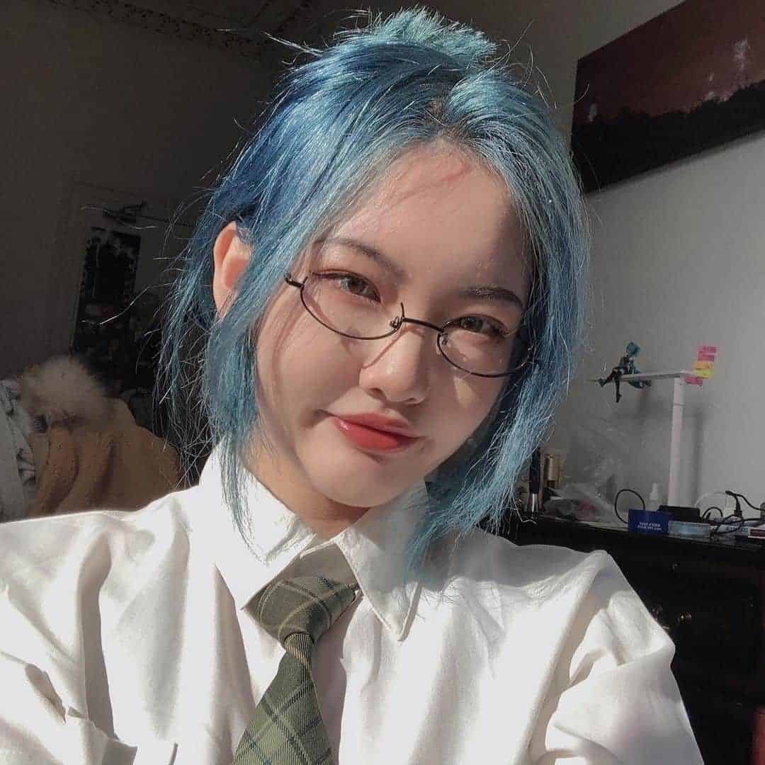 Pastel Denim Blue Hair With Long Curtain Bangs