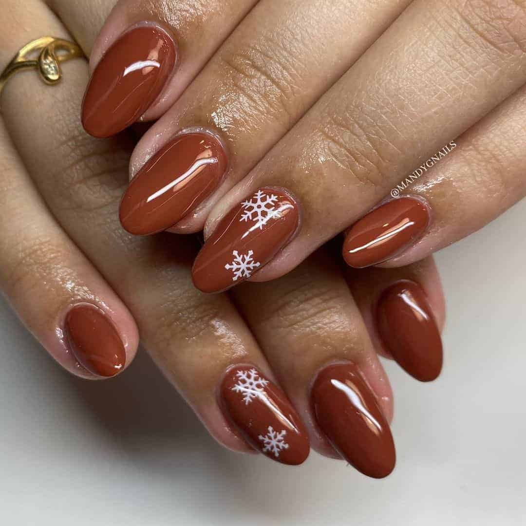 Orange Snowflake Nails