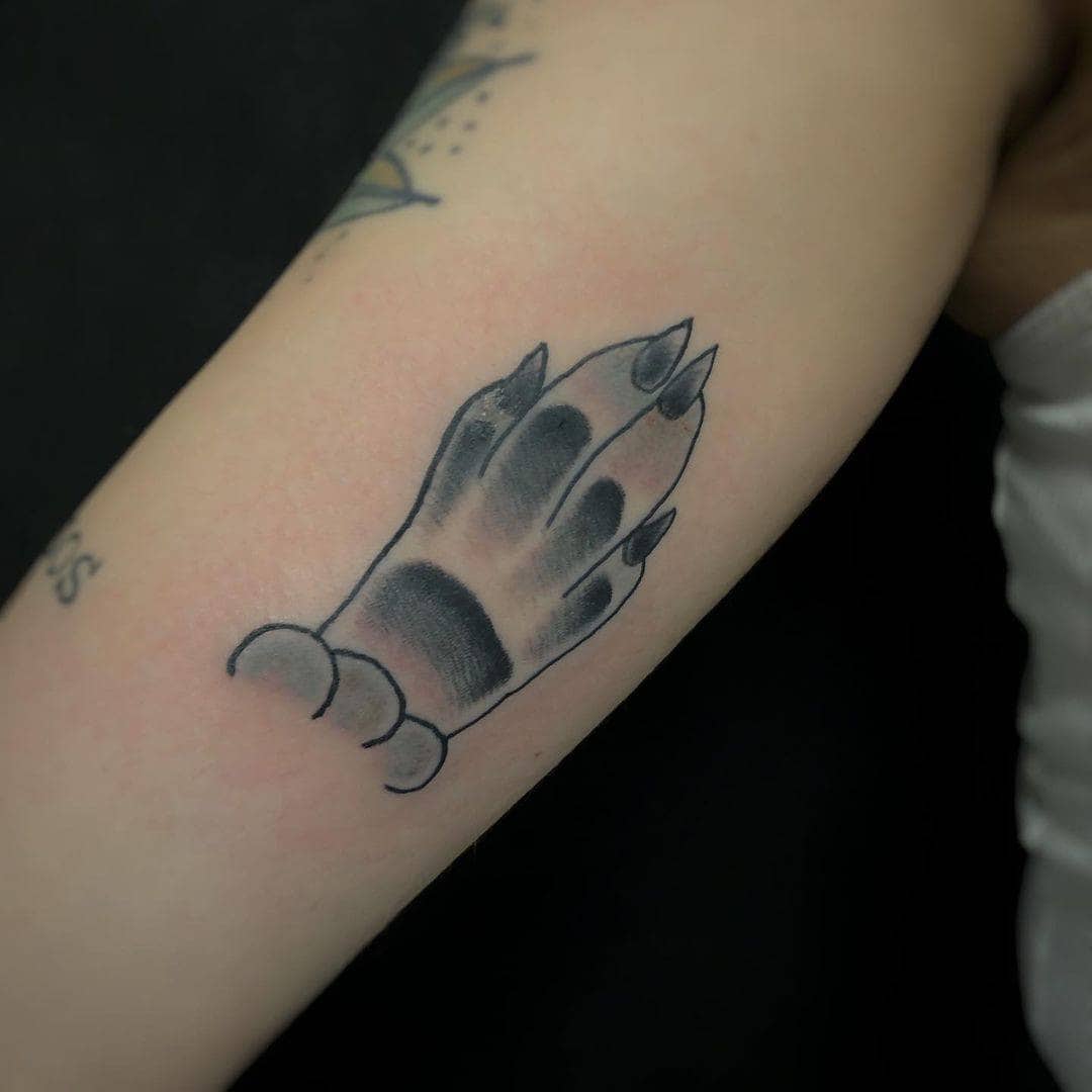 Simpsons Style Paw Tattoo