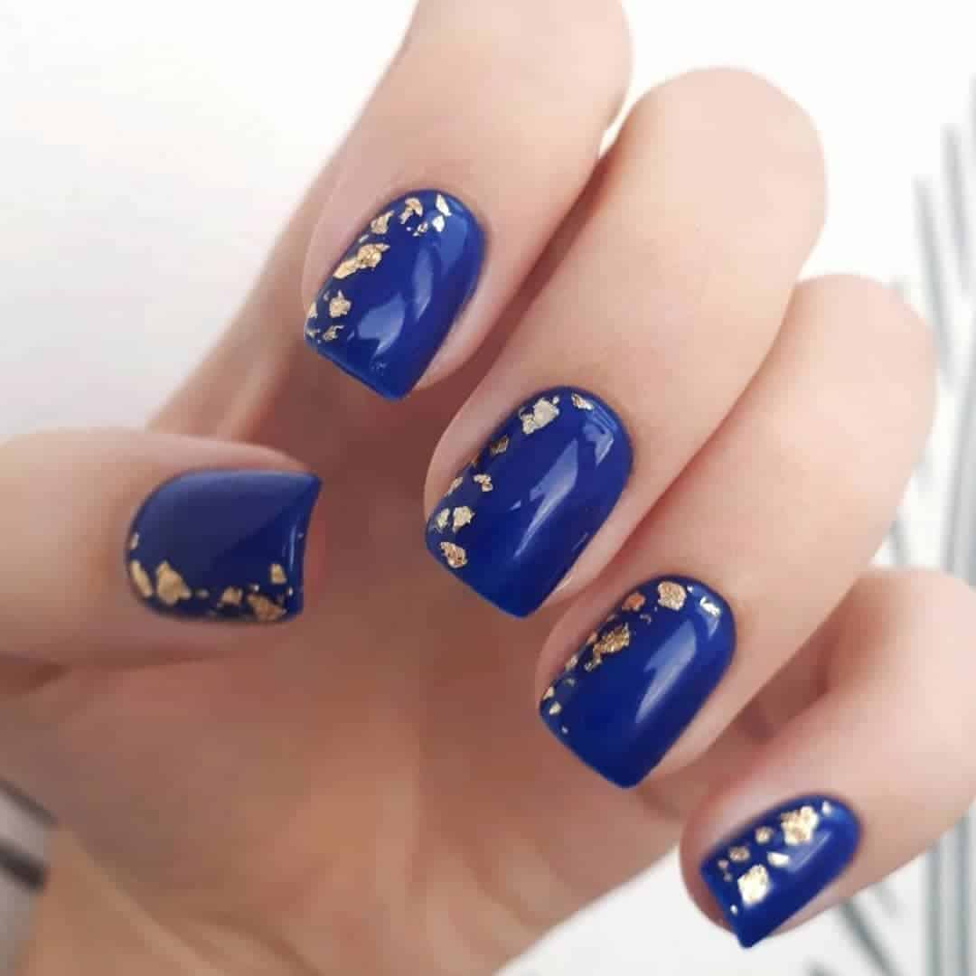 Blue Nails With Gold Flakes