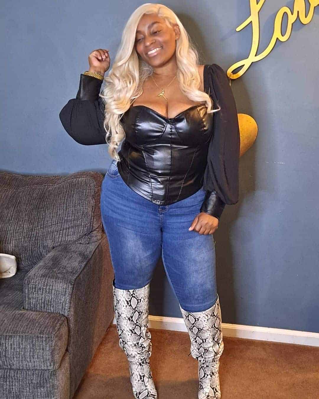 Leather Corset, Jeans, and Snake Print Boots