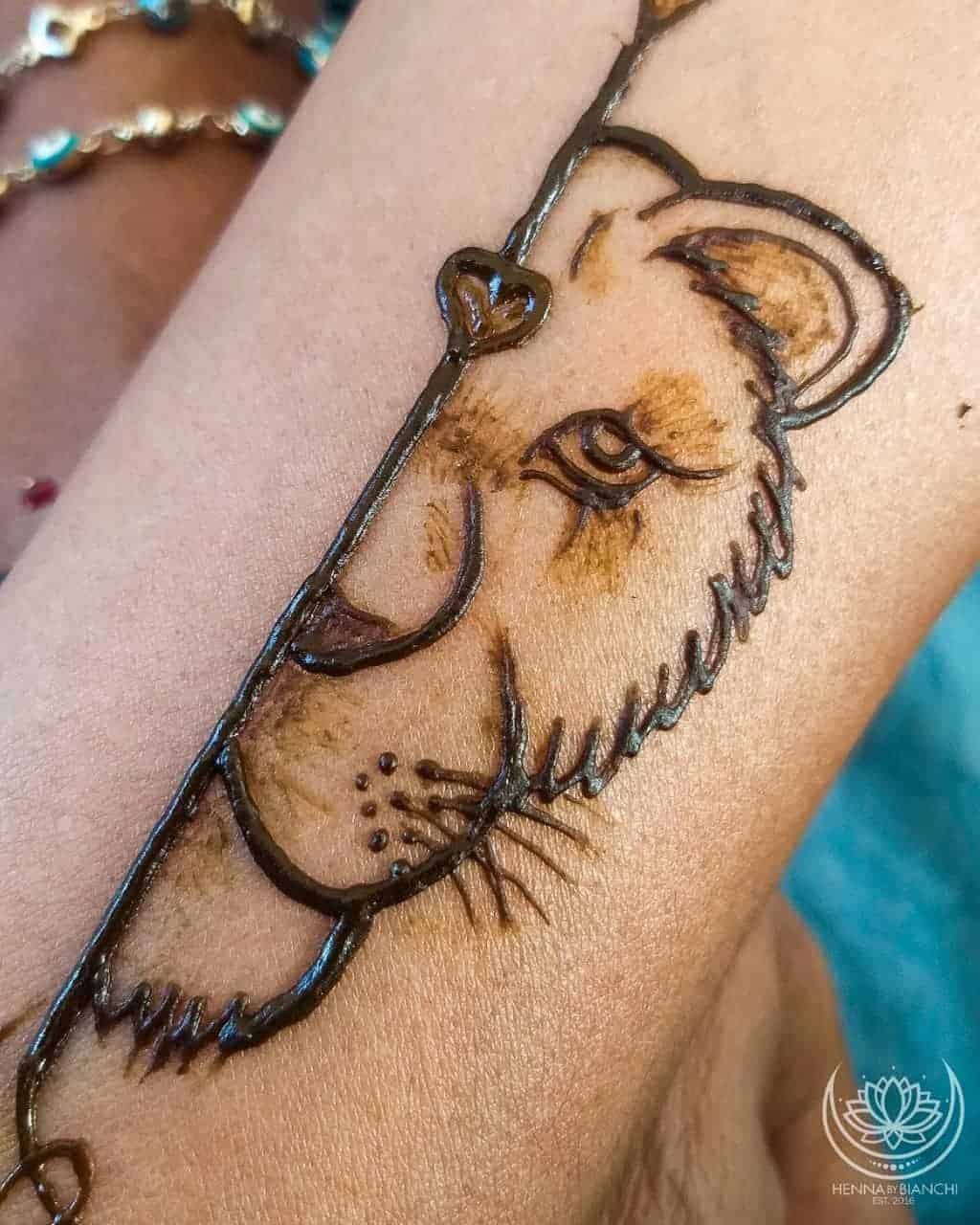 Lion and Arrow Henna Tattoo