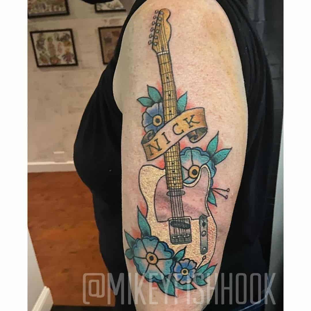 Guitar and Name Family Tattoo