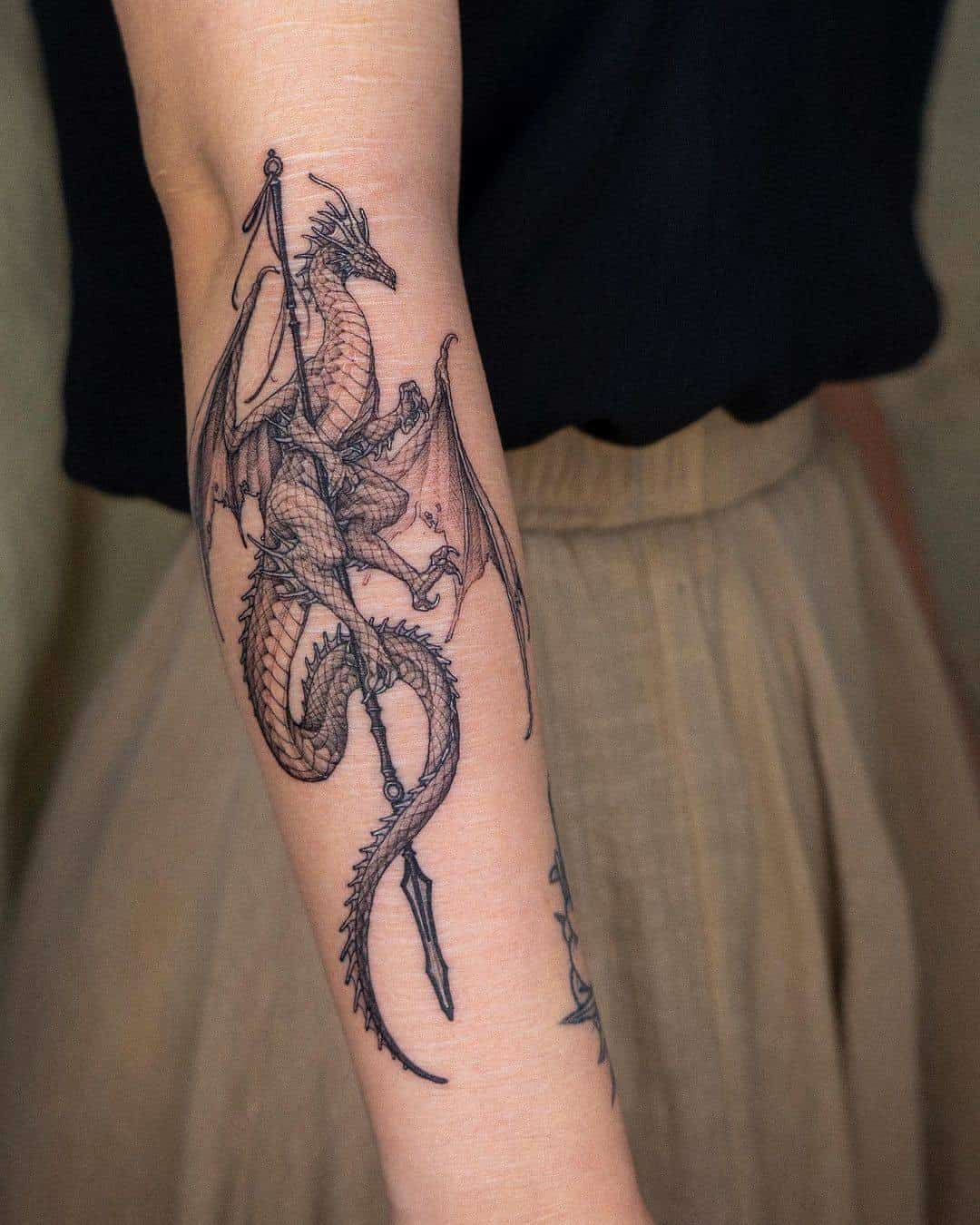 Dragon With Spear Tattoo