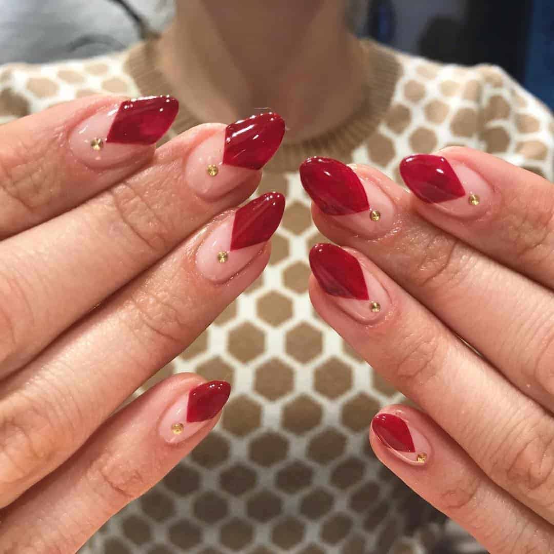 Bold Red Nails With Jewels