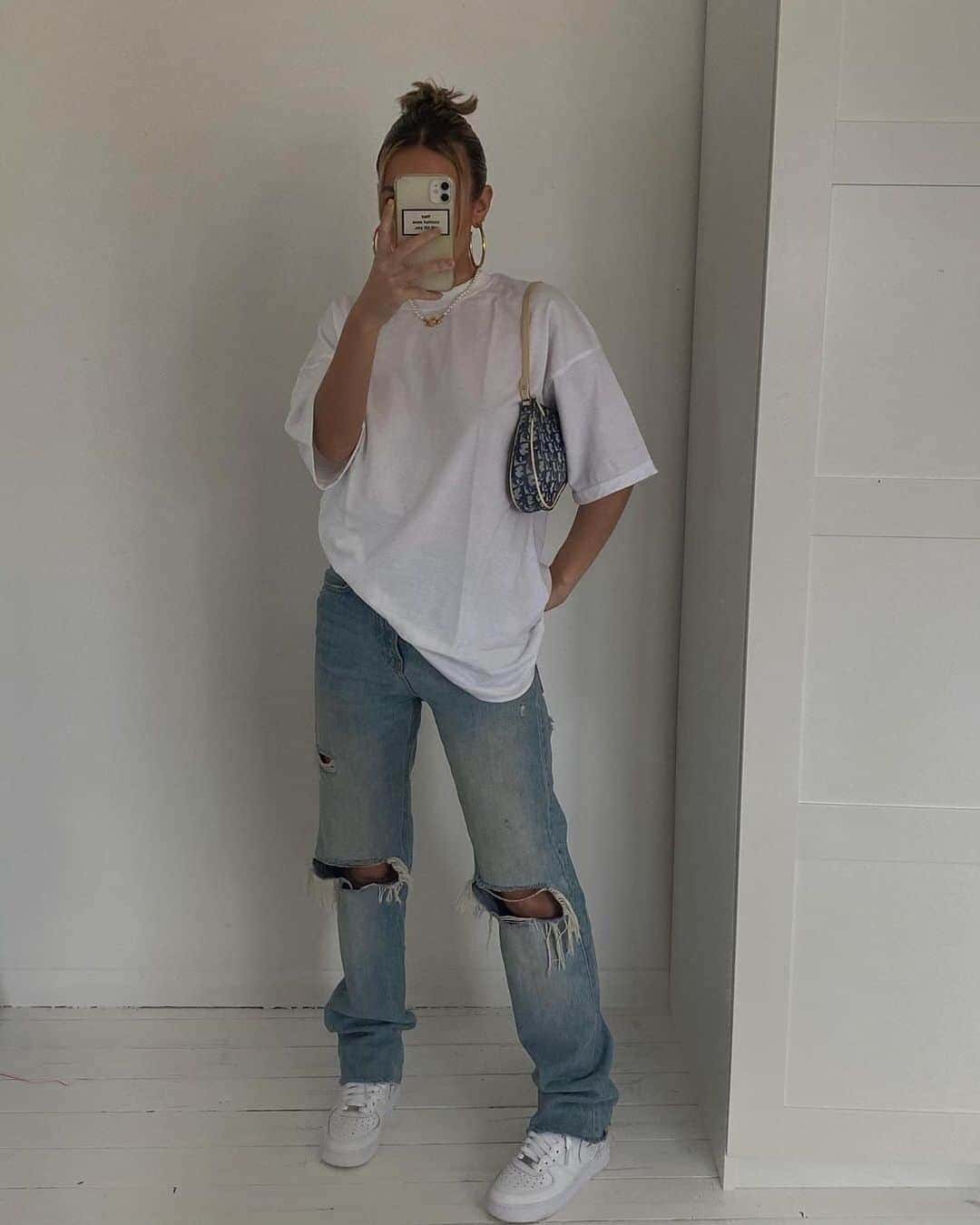 Oversized T-Shirt and Ripped Mom Jeans