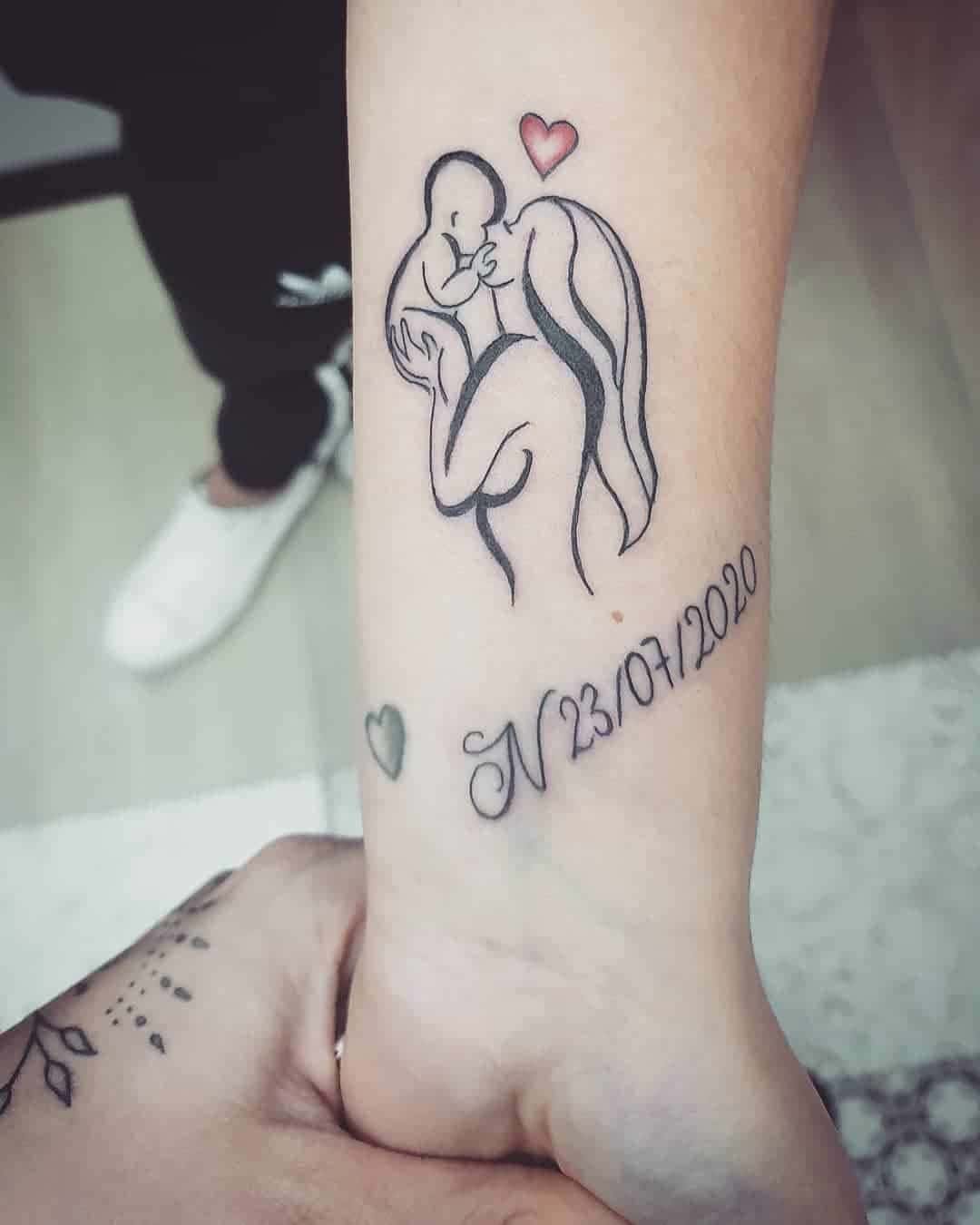 Woman and Baby With Birth Date Tattoo