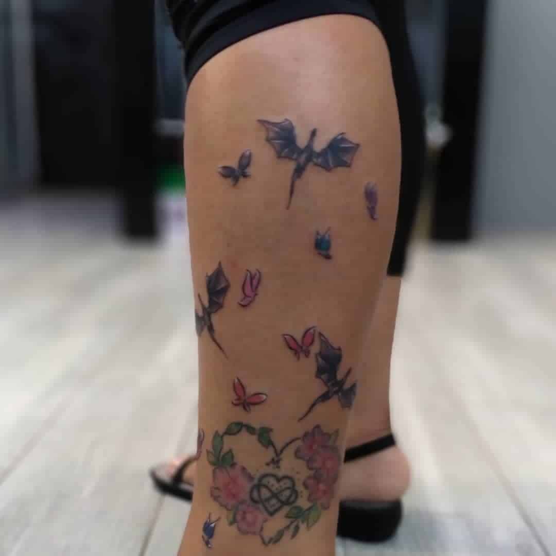 Dragons, Butterflies, and Birds Tattoo