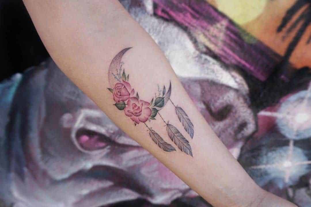 Roses, Moon, and Feathers