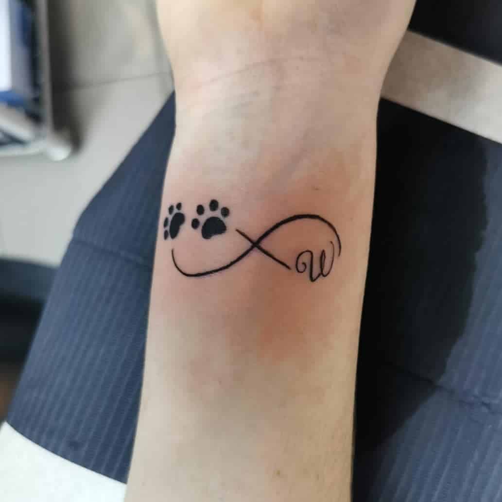 Infinity Symbol, Initial, and Pawprints Tattoo