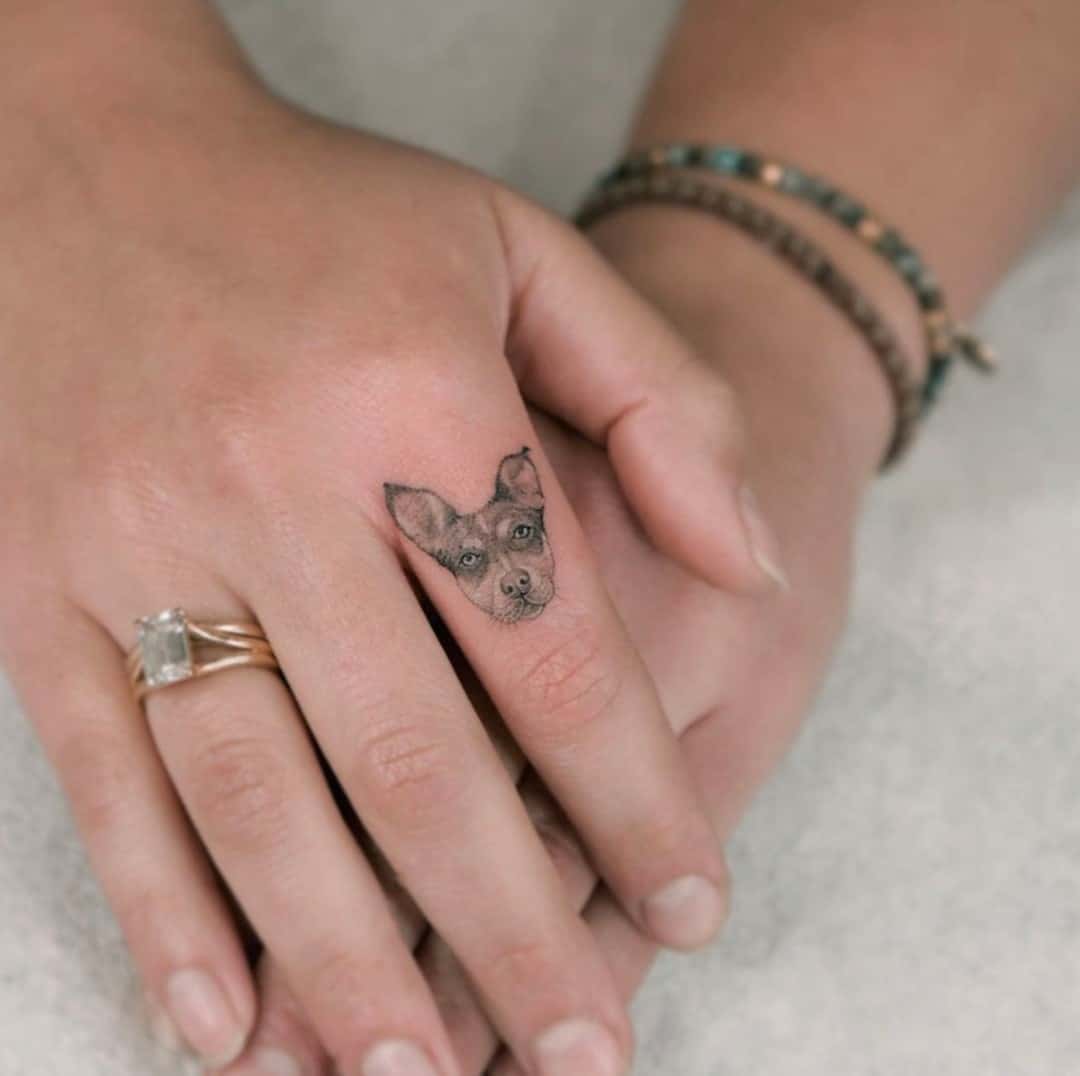 Dog Finger Tattoo