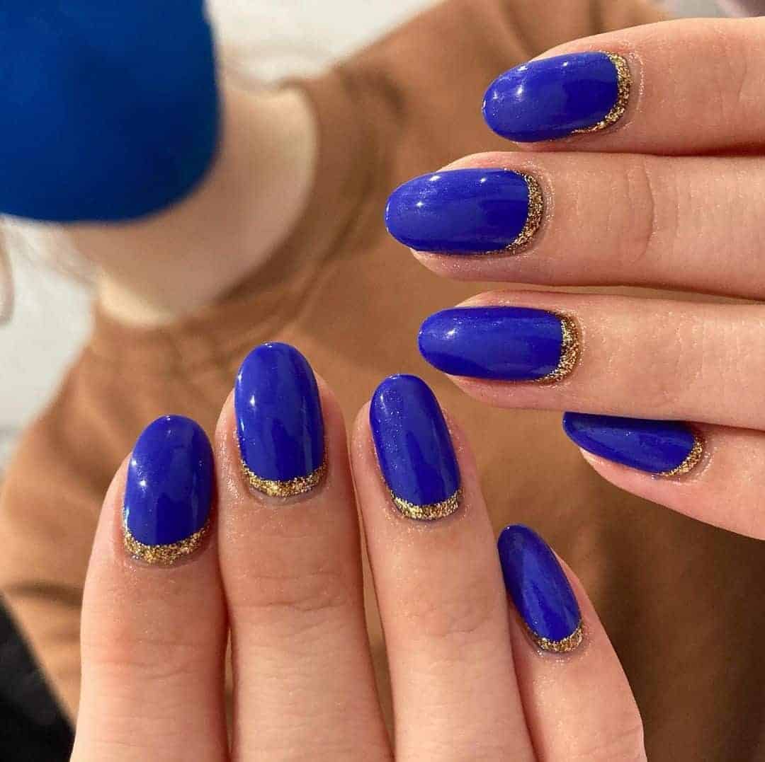 Blue Nails With Golden Cuticles