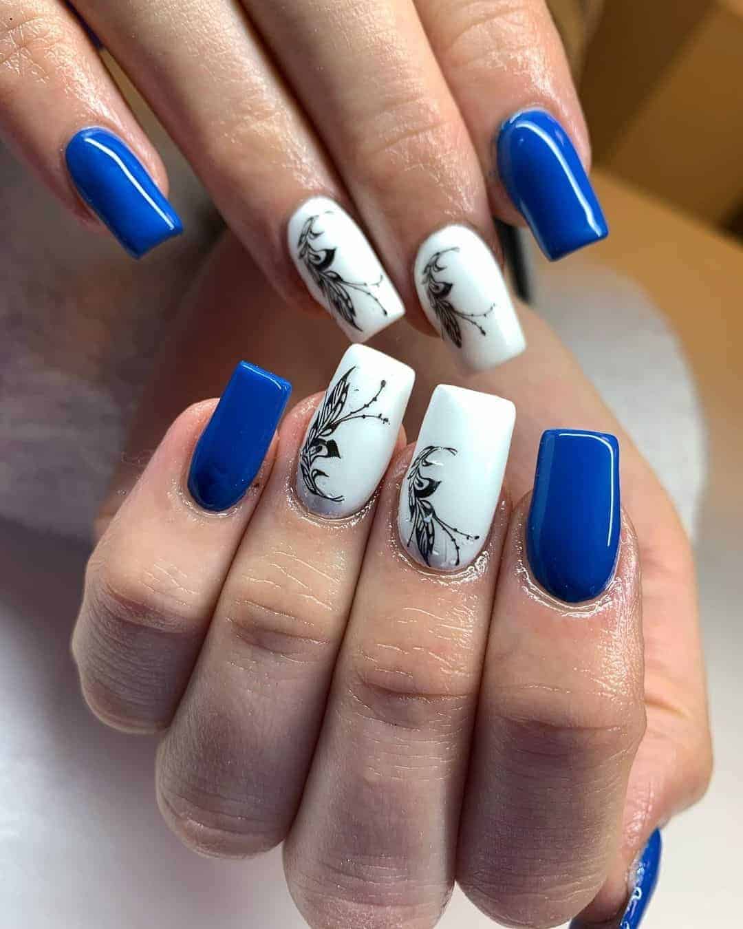 Blue Nails With a Black and White Floral Silhouette