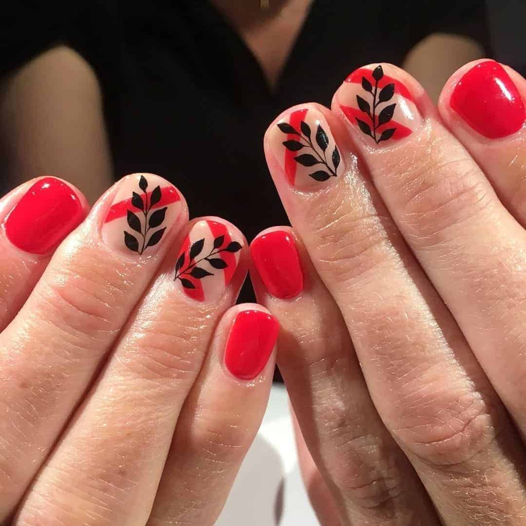 Red Nails With Nature Accents