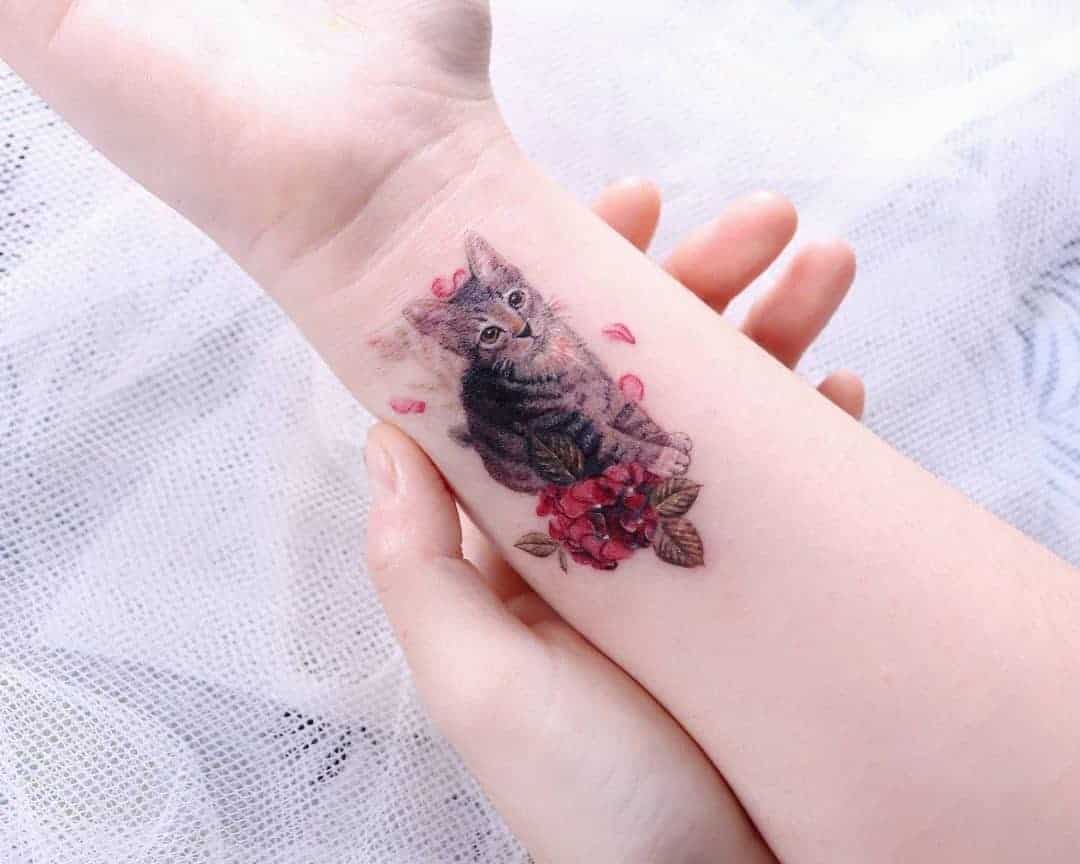 Tiny Watercolor Cat Tattoo