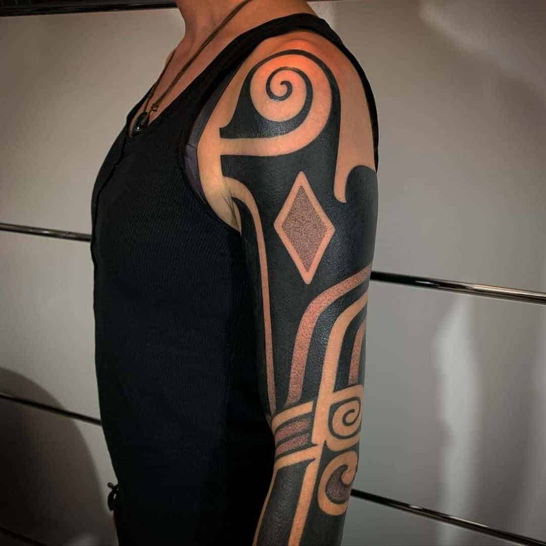 Black Ornamental Sleeve Tattoo