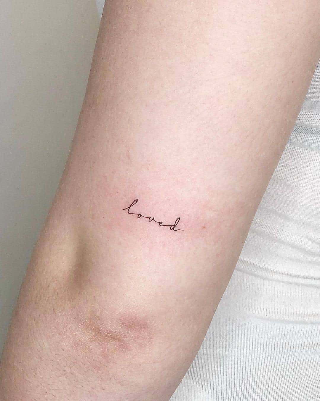 Simple One Word Family Tattoo