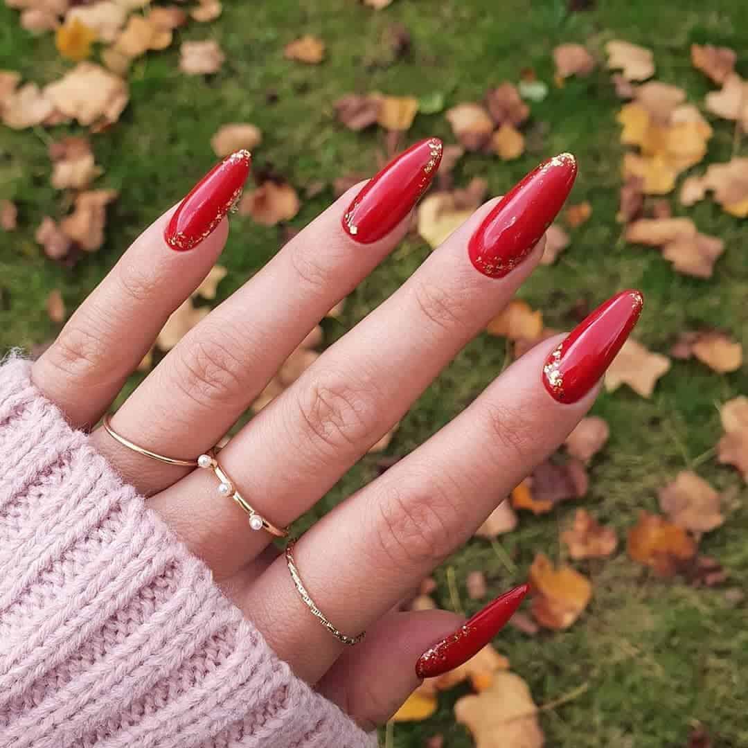 Red Nails With Metallic Gold Accents