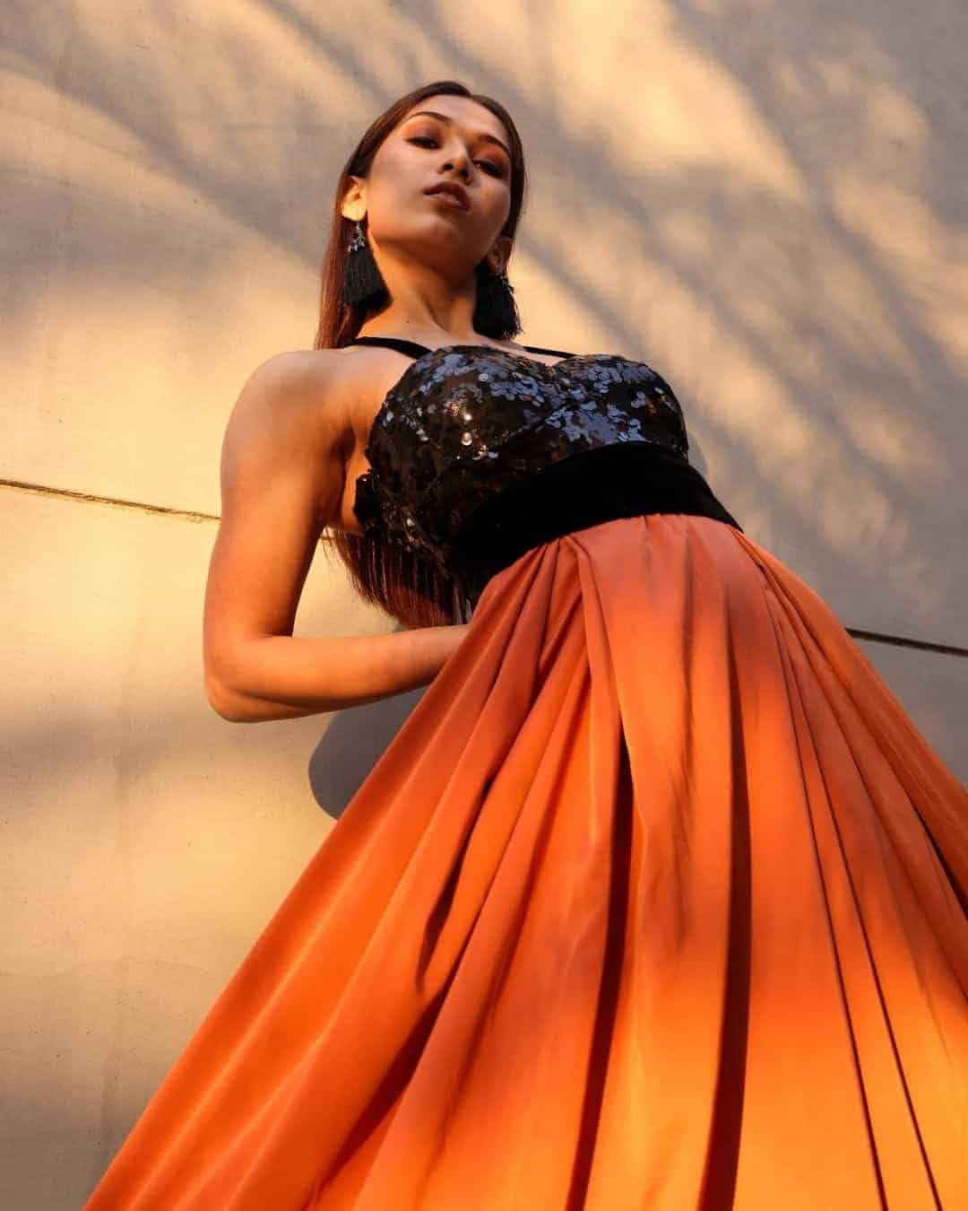 Black Sequin Top and Rust Silk Skirt