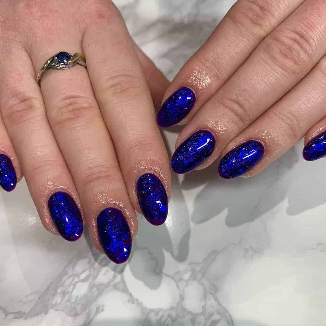 Glossy Galaxy Dark Blue Nails