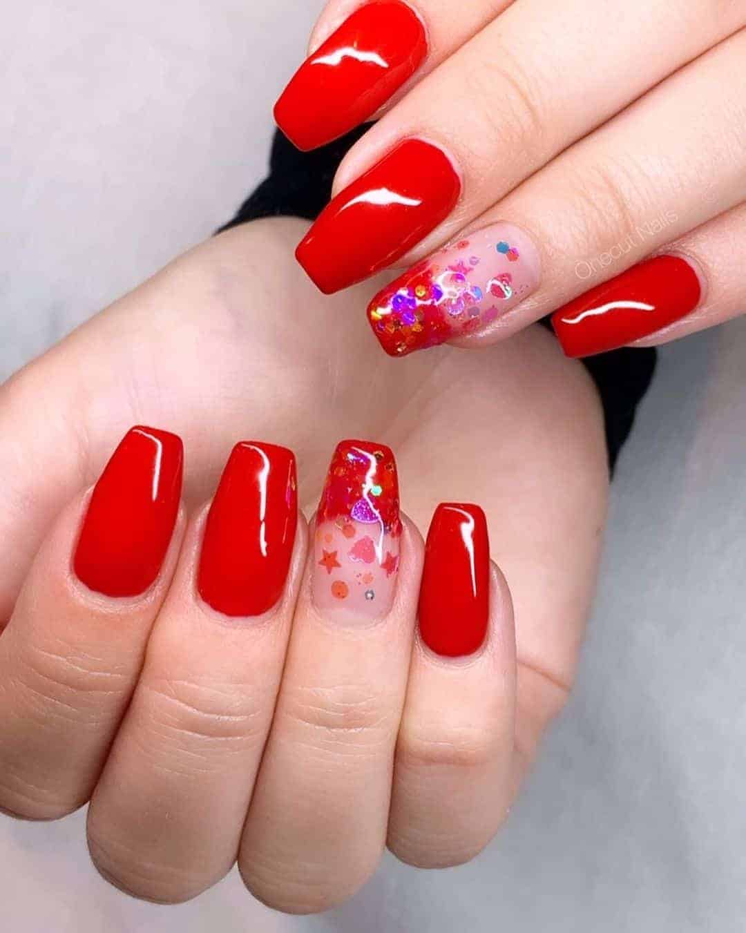 Glossy Red Nails With Stars